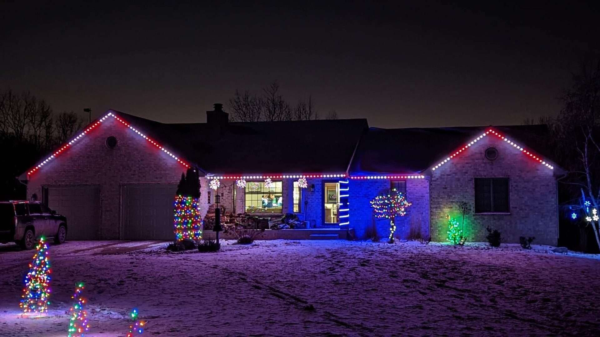Amazing let setup on a house that is using our DIY permanent christmas lights