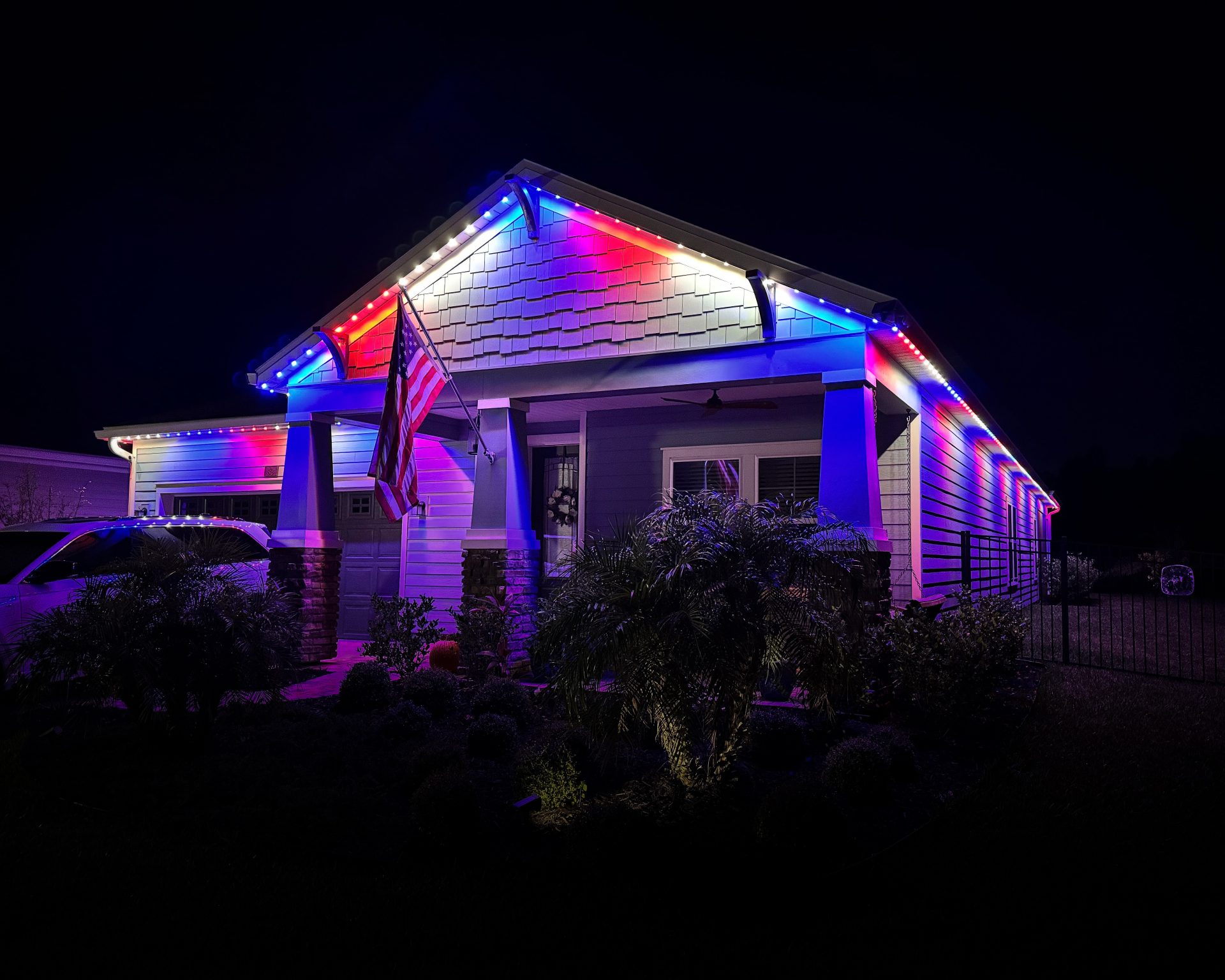 Permanent outdoor lights with red white and blue