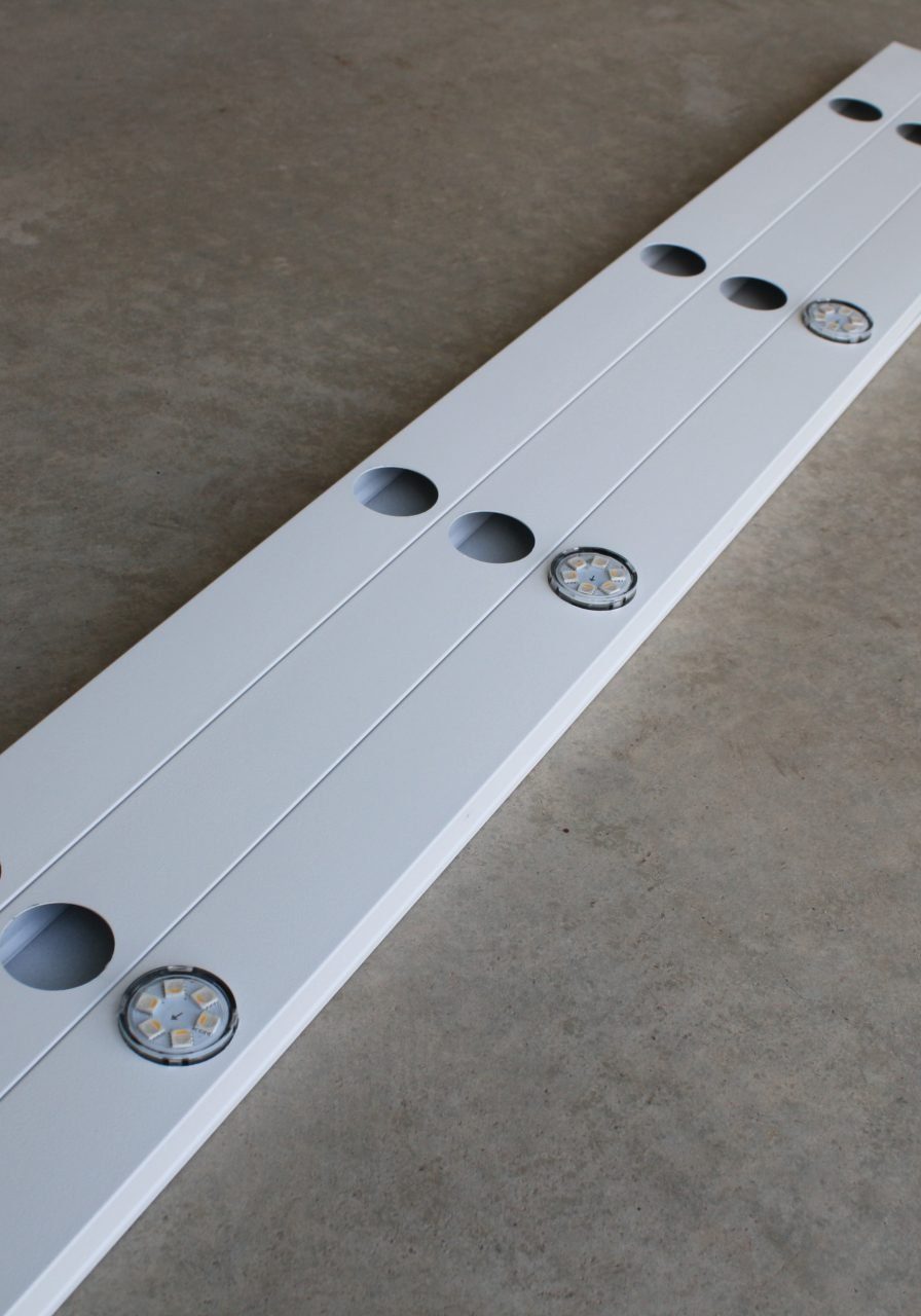 White aluminum track for permanent outdoor lights used for 30.4mm RGBW lights with 9 inch spacing